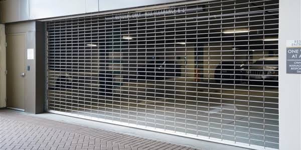 Steel grill parking gate at commercial parkade entrance